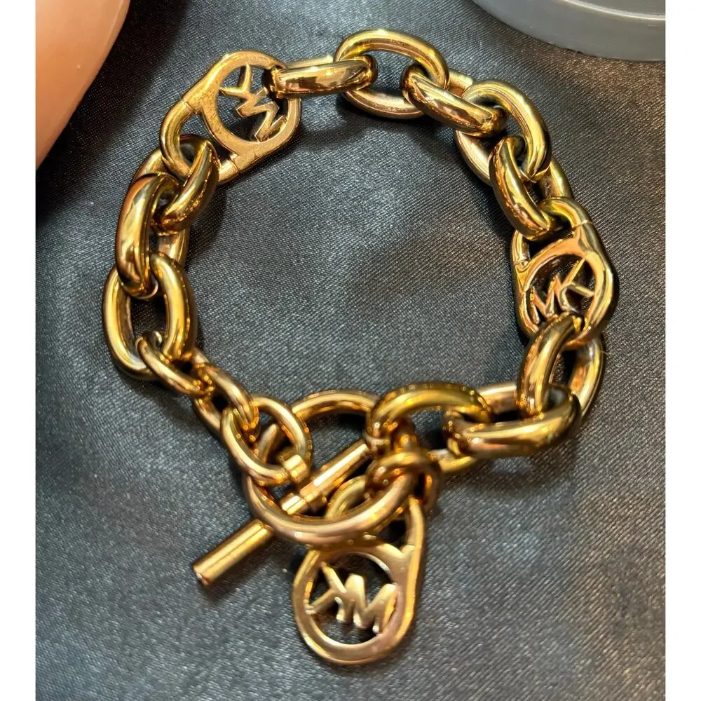Michael Kors Chunky Gold Tone Chain Bracelet w/ MK Charms Toggle Sz 6.5”